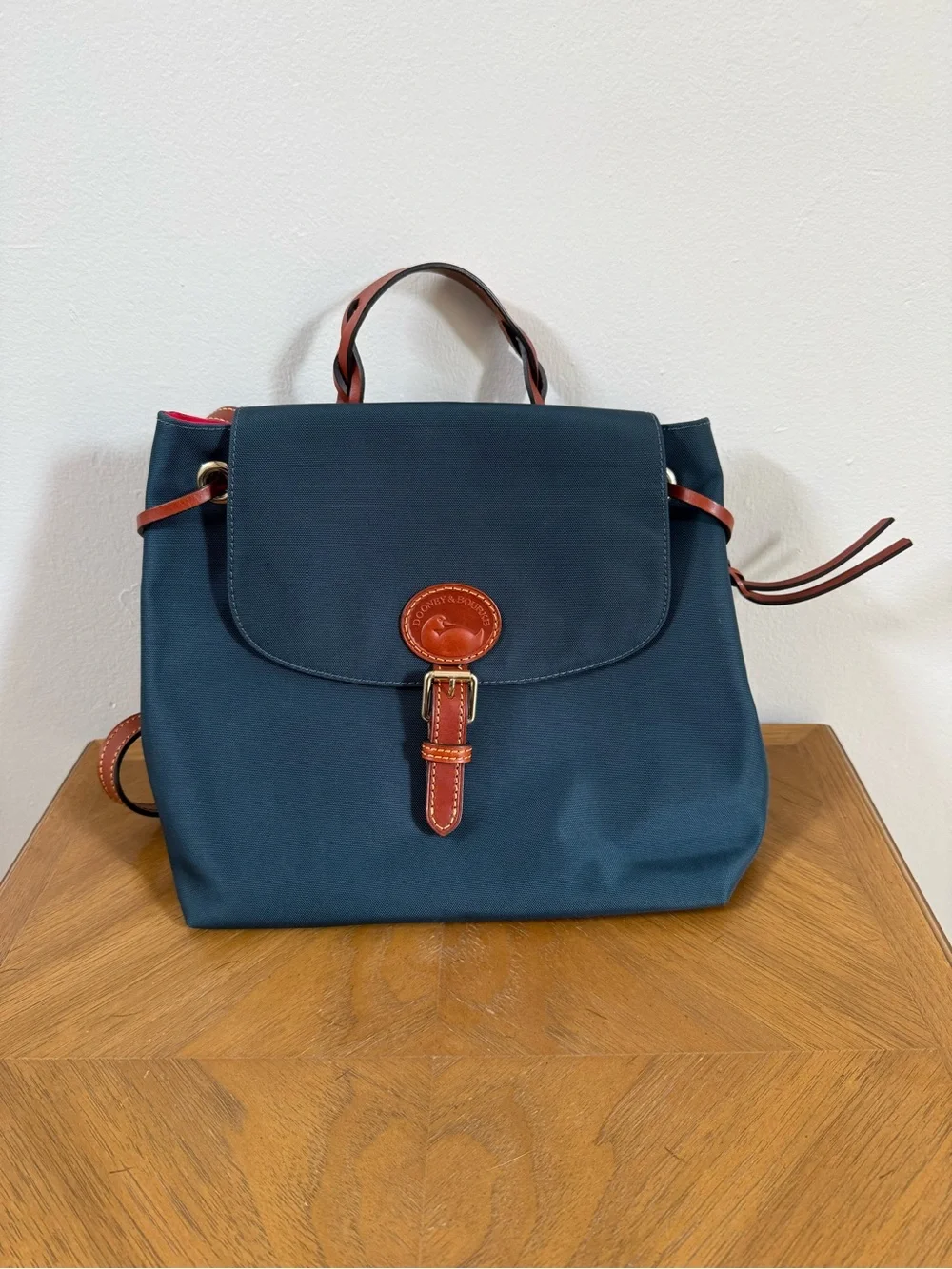 Dooney & Bourke Navy Backpack with Brown Leather Accents